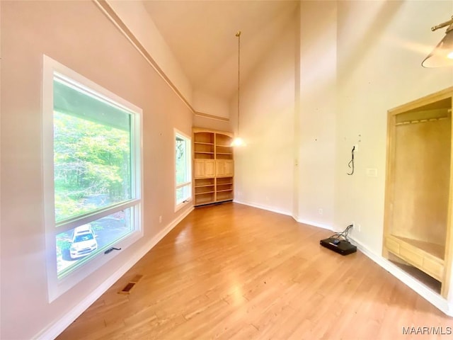 400 Millcreek Rd, Wetumpka, AL 36093 - unfurnished room featuring wood finished floors and high vaulted ceiling