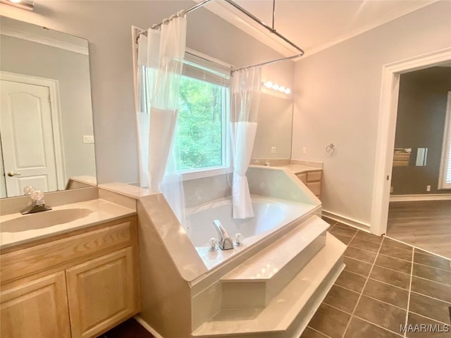 400 Millcreek Rd, Wetumpka, AL 36093 - bathroom with healthy amount of natural light, a bath, vanity, tile patterned flooring, and ornamental molding