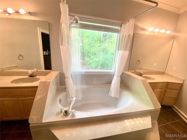 400 Millcreek Rd, Wetumpka, AL 36093 - full bathroom featuring tile patterned floors, a garden tub, and two vanities