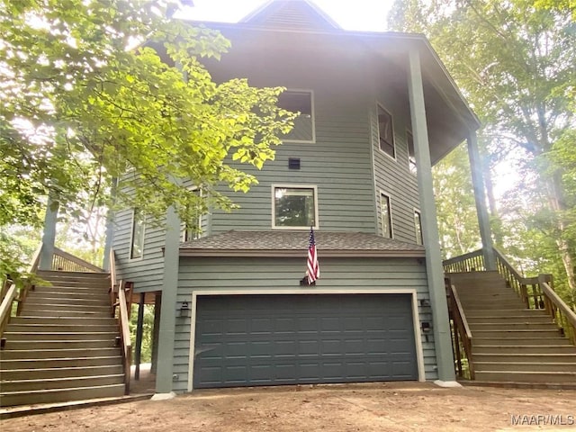 400 Millcreek Rd, Wetumpka, AL 36093 - view of front of home with stairs, an attached garage, and concrete driveway