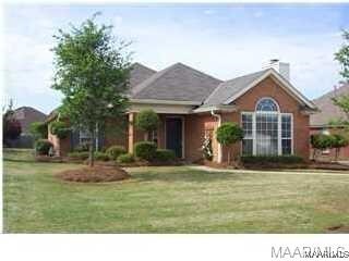 9324 Bristlecone Dr, Montgomery, AL 36117 - single story home with a front lawn and a chimney