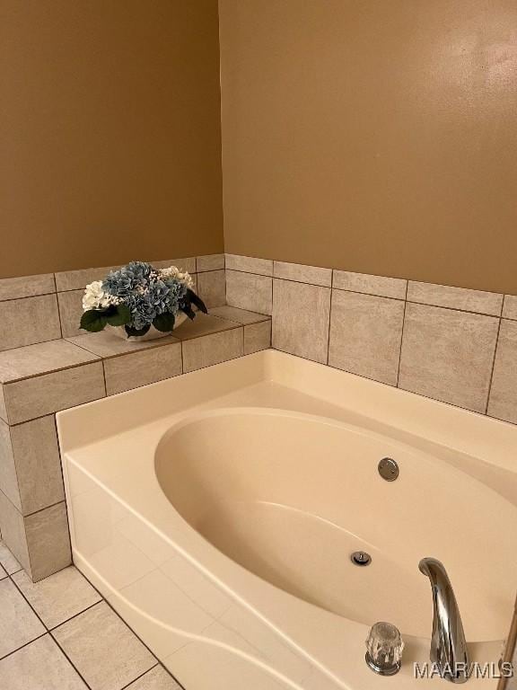 9324 Bristlecone Dr, Montgomery, AL 36117 - bathroom with a garden tub and tile patterned flooring