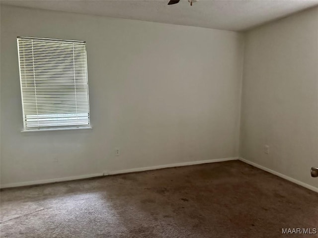 174 Weldon Rd, Tallassee, AL 36078 - empty room featuring carpet flooring and ceiling fan