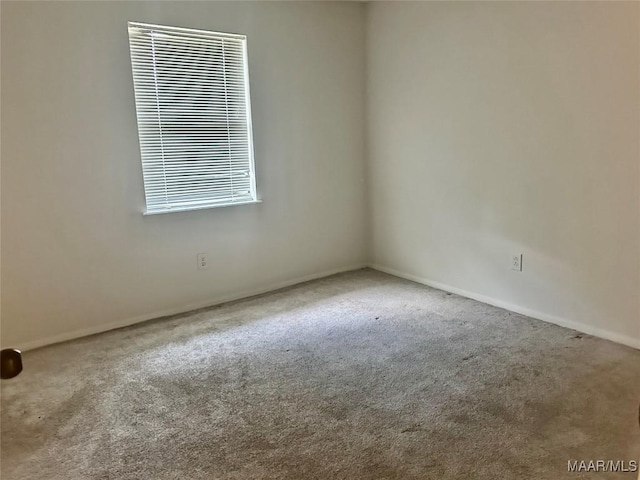 174 Weldon Rd, Tallassee, AL 36078 - carpeted spare room featuring baseboards