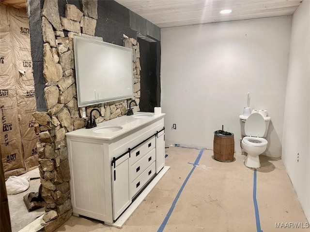 174 Weldon Rd, Tallassee, AL 36078 - full bath with double vanity and concrete floors
