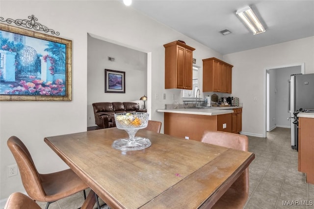 6779 Overview Dr, Montgomery, AL 36117 - dining space featuring baseboards and light tile patterned flooring