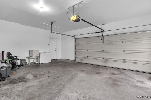 6779 Overview Dr, Montgomery, AL 36117 - garage featuring a garage door opener