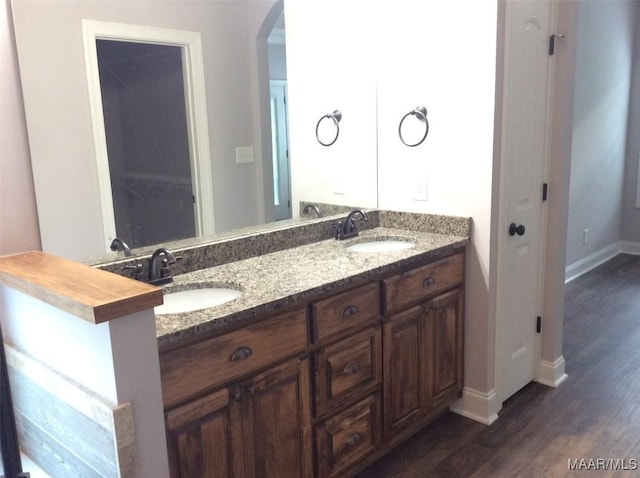 101 Regans Way S, Deatsville, AL 36022 - bathroom with wood finished floors, double vanity, and a closet