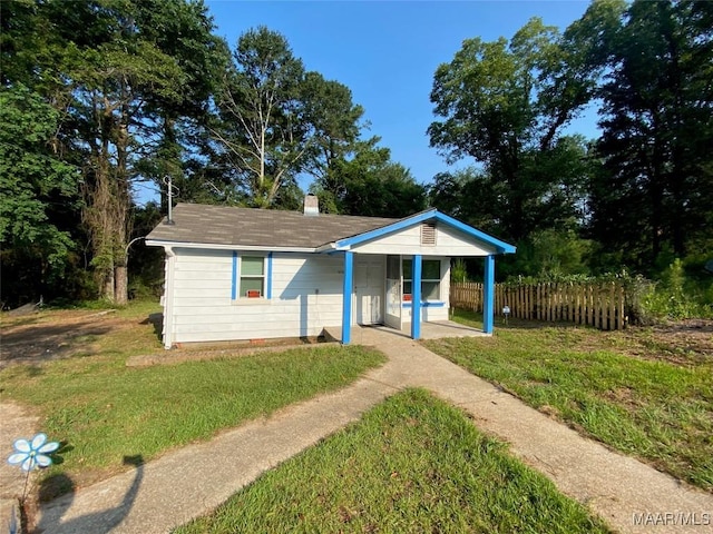 1010 New St, Tuskegee, AL 36083 - bungalow featuring a chimney
