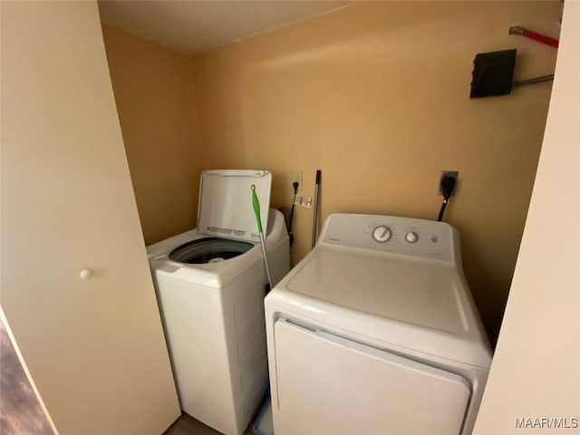 1010 New St, Tuskegee, AL 36083 - laundry area featuring separate washer and dryer