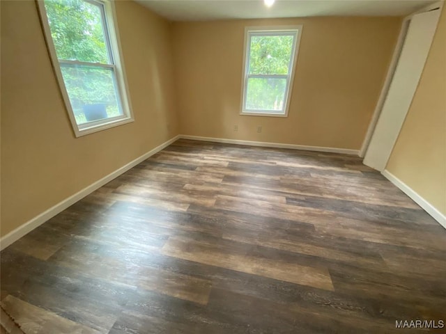 1010 New St, Tuskegee, AL 36083 - unfurnished room featuring wood finished floors and baseboards