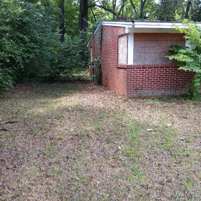 629 Doris St, Montgomery, AL 36105 - view of side of home featuring brick siding