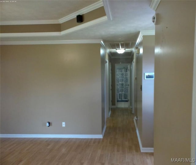 213 Foxdale Rd, Millbrook, AL 36054 - corridor featuring attic access, light wood finished floors, and ornamental molding