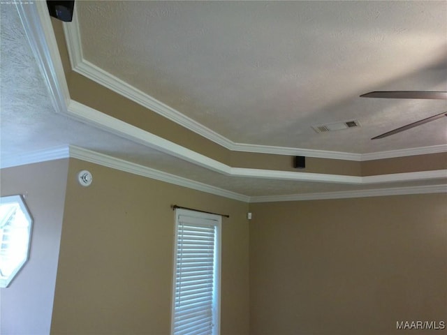 213 Foxdale Rd, Millbrook, AL 36054 - detailed view of ornamental molding, a smoke detector, a textured ceiling, and ceiling fan