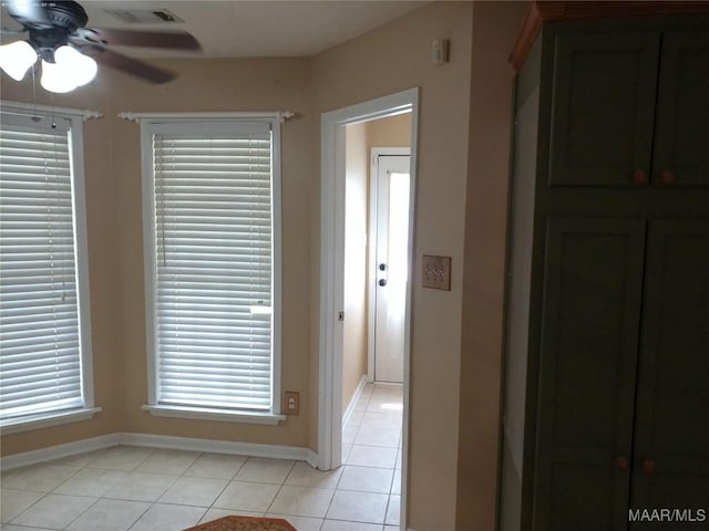213 Foxdale Rd, Millbrook, AL 36054 - corridor featuring light tile patterned flooring and baseboards