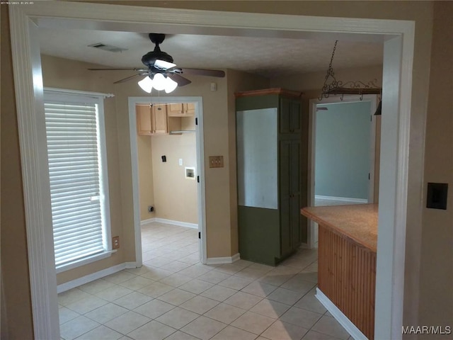 213 Foxdale Rd, Millbrook, AL 36054 - kitchen featuring light tile patterned floors and ceiling fan