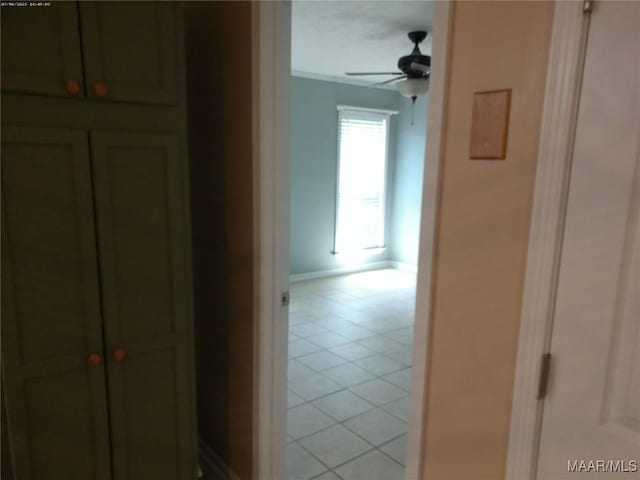 213 Foxdale Rd, Millbrook, AL 36054 - hallway with light tile patterned floors and baseboards