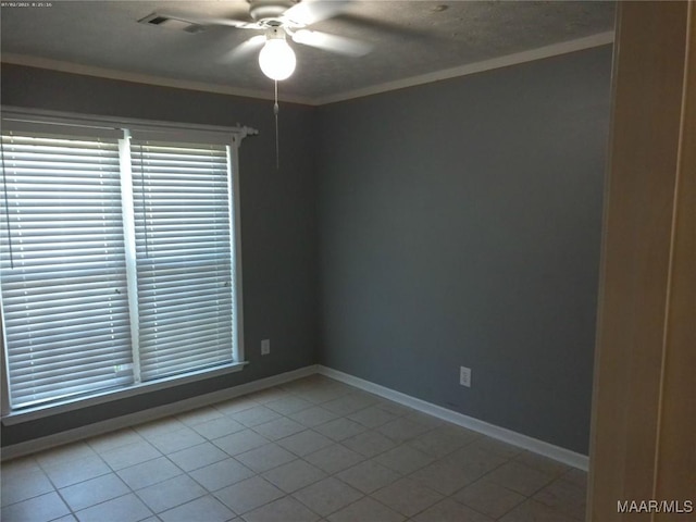 213 Foxdale Rd, Millbrook, AL 36054 - spare room featuring a ceiling fan, light tile patterned flooring, and ornamental molding