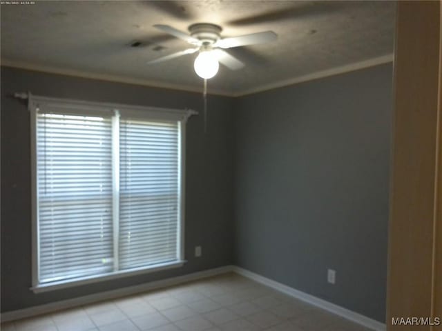 213 Foxdale Rd, Millbrook, AL 36054 - unfurnished room with a ceiling fan, light tile patterned flooring, and ornamental molding