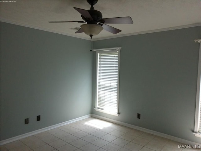 213 Foxdale Rd, Millbrook, AL 36054 - spare room with a ceiling fan, healthy amount of natural light, light tile patterned flooring, and crown molding