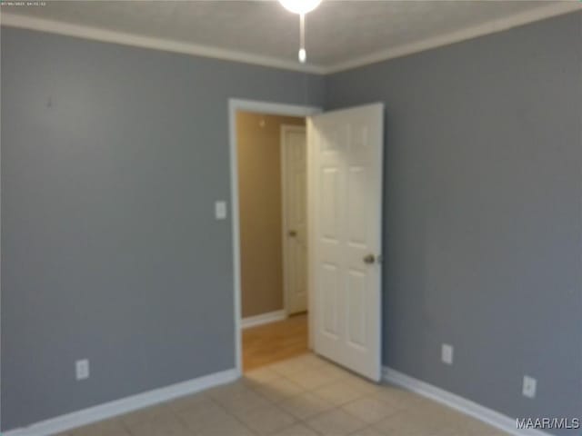 213 Foxdale Rd, Millbrook, AL 36054 - spare room with light tile patterned floors and baseboards