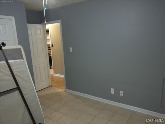 213 Foxdale Rd, Millbrook, AL 36054 - spare room featuring light tile patterned floors and baseboards