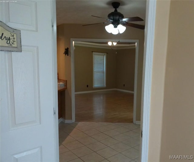 213 Foxdale Rd, Millbrook, AL 36054 - hallway with light tile patterned floors and baseboards