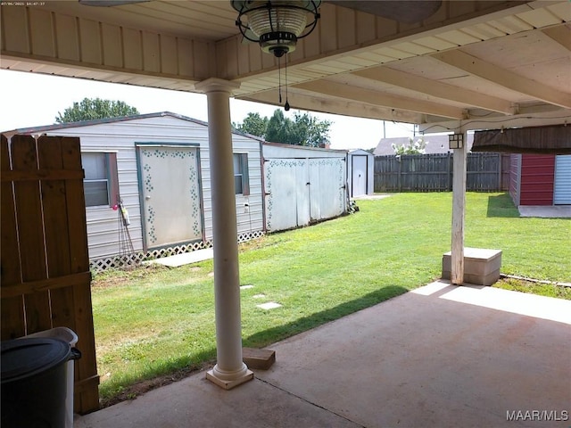 213 Foxdale Rd, Millbrook, AL 36054 - view of yard with a storage shed and a patio area