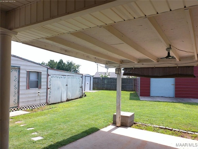 213 Foxdale Rd, Millbrook, AL 36054 - view of yard with a shed and a patio area