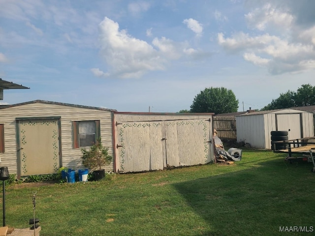 213 Foxdale Rd, Millbrook, AL 36054 - view of green lawn with a shed