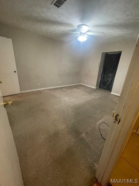 3440 Wickham Rd, Montgomery, AL 36116 - empty room featuring carpet, a textured ceiling, and a ceiling fan