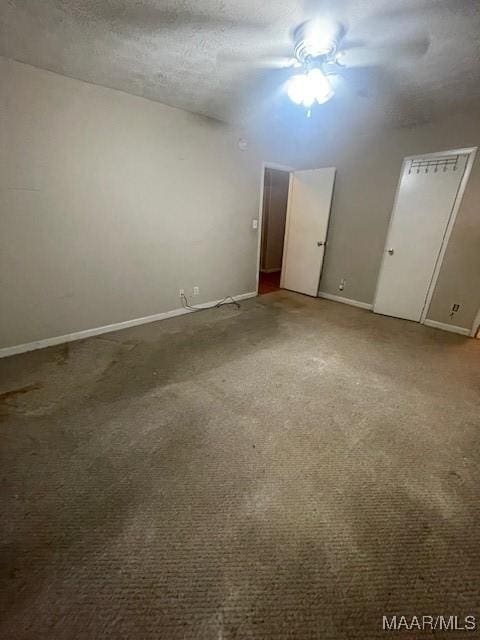 3440 Wickham Rd, Montgomery, AL 36116 - unfurnished room with ceiling fan, carpet, and a textured ceiling
