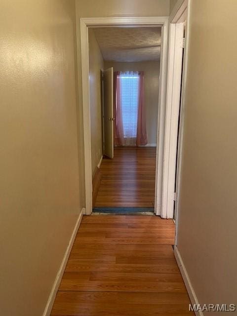 3440 Wickham Rd, Montgomery, AL 36116 - hallway featuring wood finished floors and baseboards