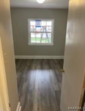 713 W Patton Ave, Montgomery, AL 36105 - spare room with baseboards and wood finished floors