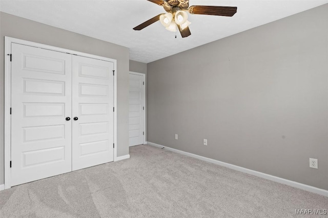 59 Gresham Dr, Millbrook, AL 36054 - unfurnished bedroom with carpet, a closet, and ceiling fan
