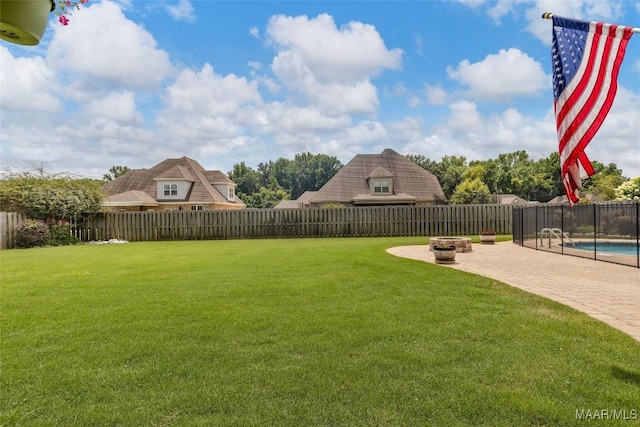 59 Gresham Dr, Millbrook, AL 36054 - fenced backyard featuring a patio area