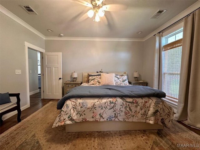 447 Cloverdale Rd, Greenville, AL 36037 - bedroom with wood finished floors, crown molding, and ceiling fan