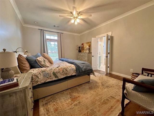 447 Cloverdale Rd, Greenville, AL 36037 - bedroom with dark wood finished floors, ornamental molding, and a ceiling fan
