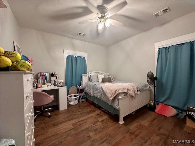 447 Cloverdale Rd, Greenville, AL 36037 - bedroom featuring wood finished floors, a desk, and a ceiling fan