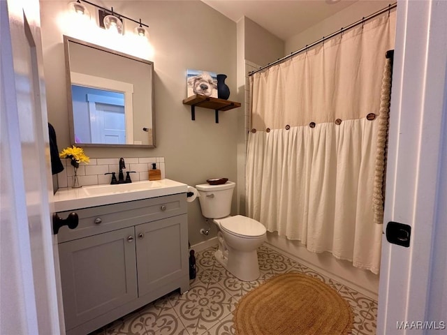 447 Cloverdale Rd, Greenville, AL 36037 - full bath with vanity, tasteful backsplash, and tile patterned flooring