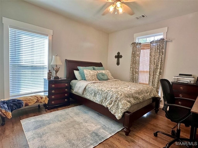 447 Cloverdale Rd, Greenville, AL 36037 - bedroom with wood finished floors, an office area, and ceiling fan