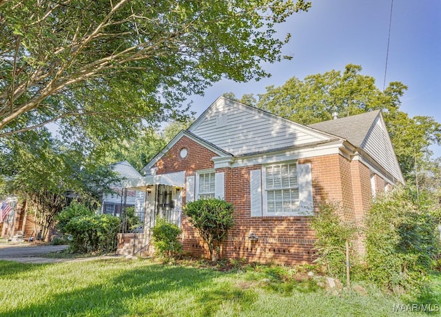 533 Morningview Dr, Montgomery, AL 36109 - bungalow-style home with brick siding and a front lawn