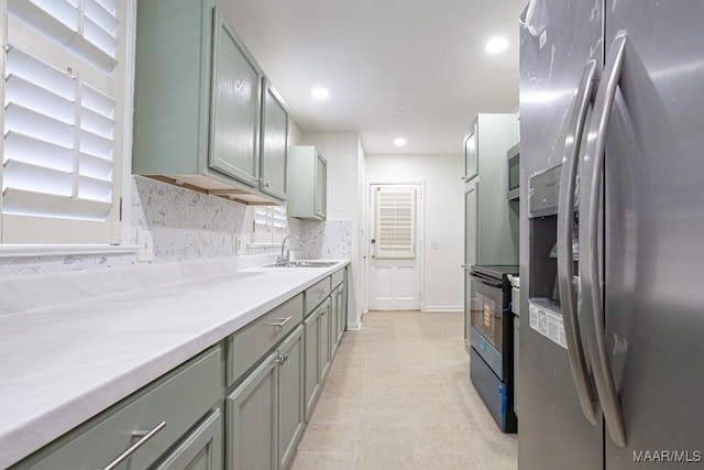 533 Morningview Dr, Montgomery, AL 36109 - kitchen with appliances with stainless steel finishes, backsplash, light countertops, recessed lighting, and gray cabinetry