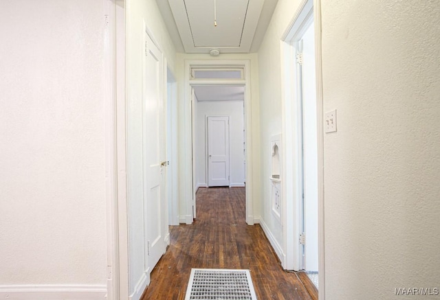 533 Morningview Dr, Montgomery, AL 36109 - hallway with attic access and dark wood-style floors