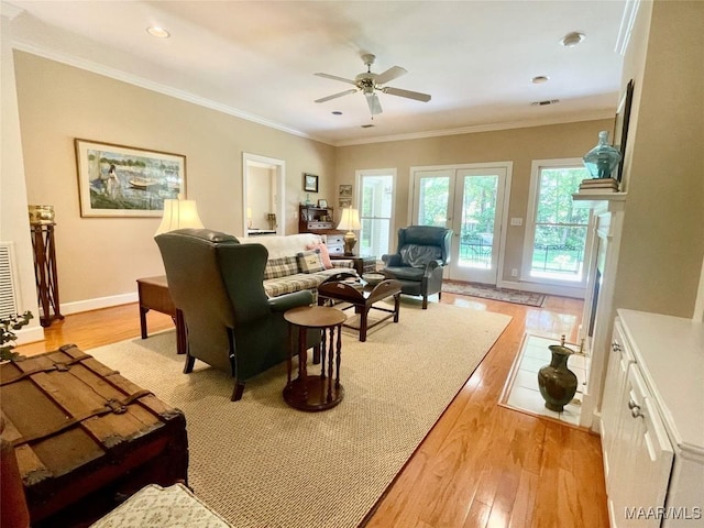 9865 Wynchase Cir, Montgomery, AL 36117 - living area featuring light wood-style flooring, a ceiling fan, crown molding, and recessed lighting