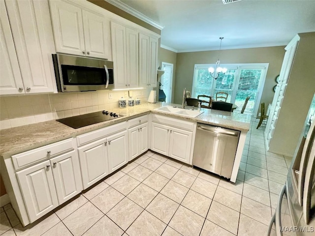 9865 Wynchase Cir, Montgomery, AL 36117 - kitchen featuring stainless steel appliances, a peninsula, crown molding, tasteful backsplash, and white cabinetry