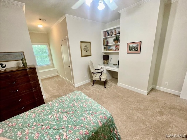 9865 Wynchase Cir, Montgomery, AL 36117 - bedroom featuring built in desk, crown molding, light colored carpet, and ceiling fan