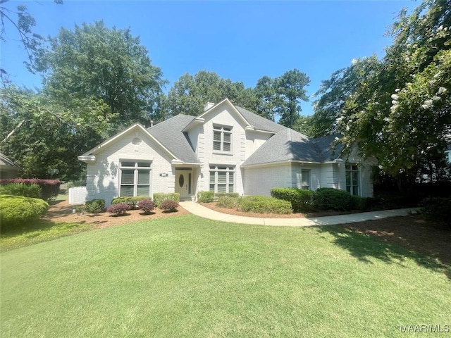 9865 Wynchase Cir, Montgomery, AL 36117 - traditional-style home featuring a front lawn and a shingled roof