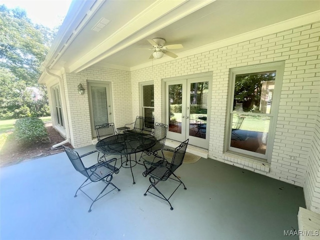 9865 Wynchase Cir, Montgomery, AL 36117 - view of patio / terrace featuring french doors, ceiling fan, and outdoor dining space