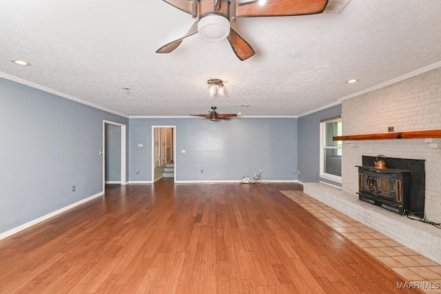 445 W Hickory Grove Rd, Lapine, AL 36046 - unfurnished living room with ceiling fan, wood finished floors, ornamental molding, recessed lighting, and a textured ceiling